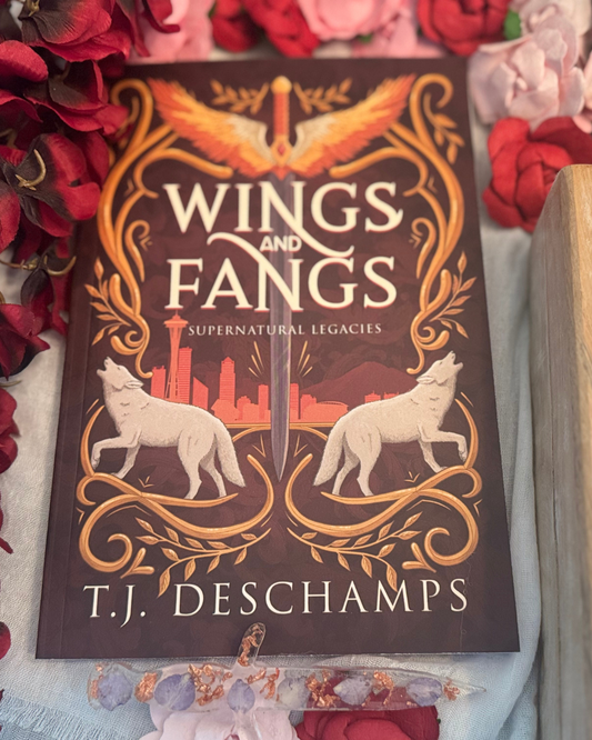 Signed copy of Wings and Fangs by T.J. Deschamps